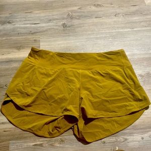 Lululemon 10 Tall. Speed Shorts. Limited edition gold color.